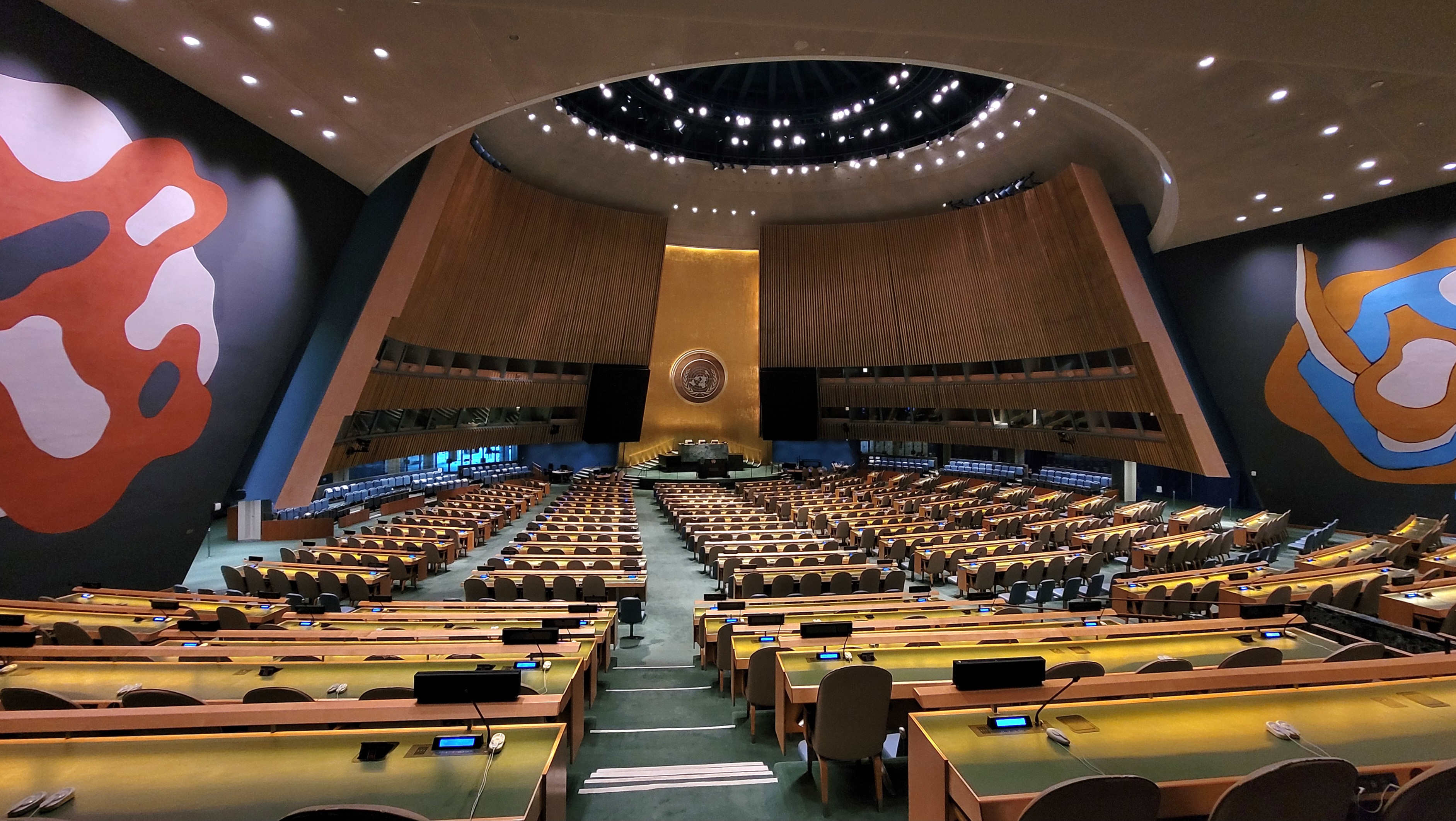 Empty rows of seats in the United Nations General Assembly hall